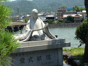 Statue of Lady Murasaki with her novel written on rolled-paper
